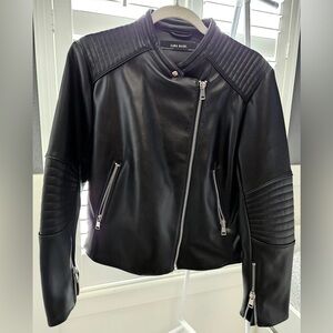ZARA black faux leather biker jacket . Front pockets and zip closure. Size XXL.